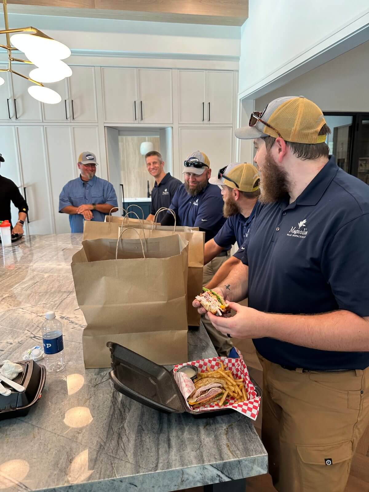 The Magnolia team gathered for lunch on site